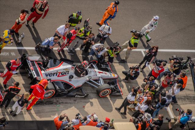 Photographers surround Will Power's Chevrolet has he climbs out victorious in the Angie's List Grand Prix of Indianapolis at the Indianapolis Motor Speedway -- Photo by: Forrest Mellott