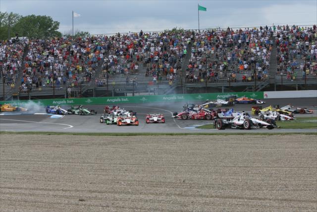 Contact in turn one during the Angie's List Grand Prix of Indianapolis -- Photo by: Joe Skibinski