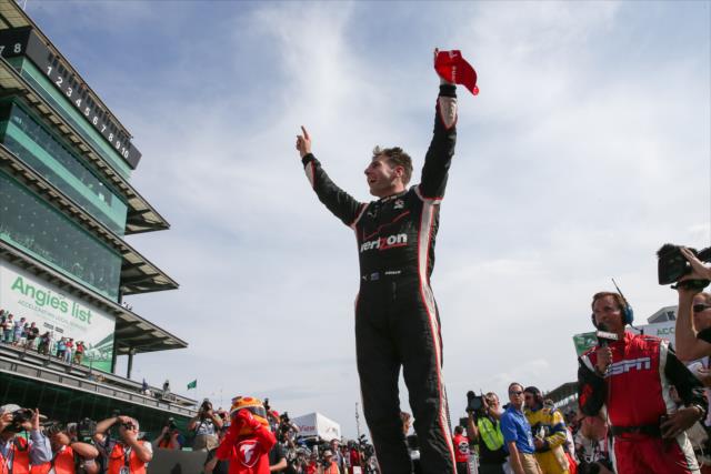 Will Power celebrates his victory in the Angie's List Grand Prix of Indianapolis at the Indianapolis Motor Speedway -- Photo by: Joe Skibinski