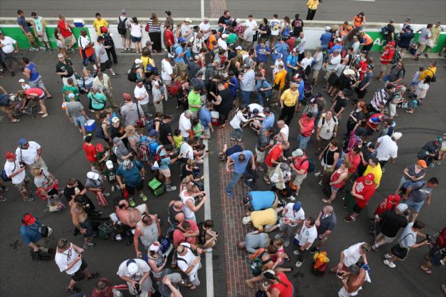 Fans gather at the yard-of-bricks during the post-race track invasion at the Indianapolis Motor Speedway -- Photo by: Joe Skibinski
