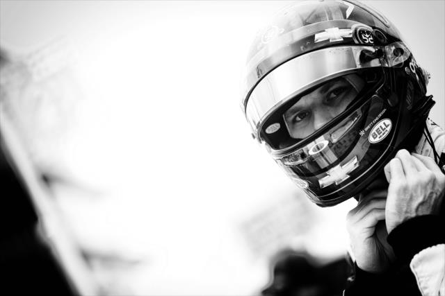Josef Newgarden straps his helmet on prior to the Angie's List Grand Prix of Indianapolis at the Indianapolis Motor Speedway -- Photo by: Shawn Gritzmacher