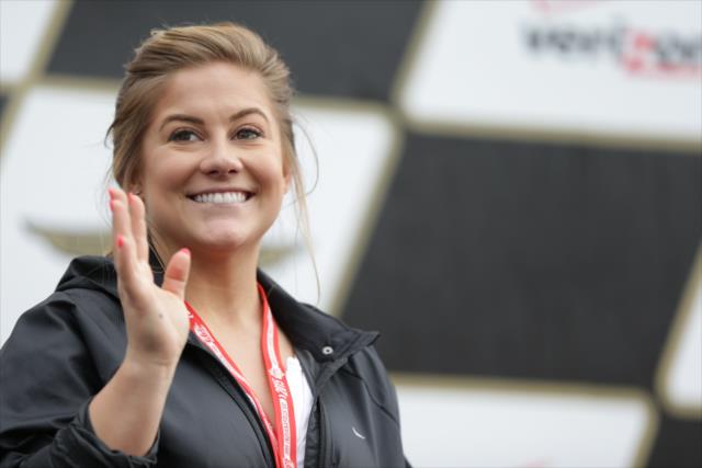 Olympic gold medalist Shawn Johnson waives to the crowd during pre-race festivities for the Angie's List Grand Prix of Indianapolis at the Indianapolis Motor Speedway -- Photo by: Shawn Gritzmacher