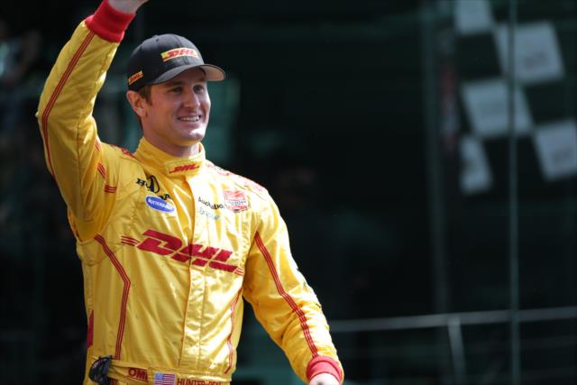 Ryan Hunter-Reay waives to the crowd during pre-race festivities for the Angie's List Grand Prix of Indianapolis at the Indianapolis Motor Speedway -- Photo by: Shawn Gritzmacher