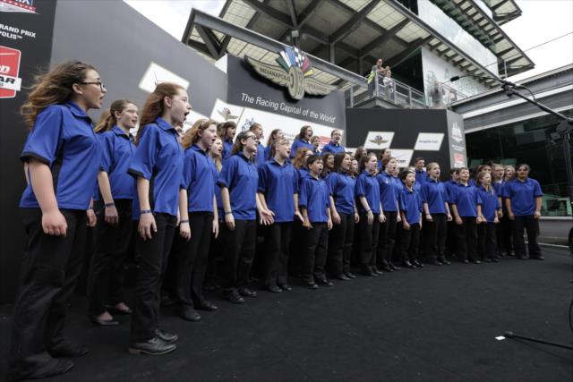 The Indianapolis Children's Choir performs the National Anthem for the Angie's List Grand Prix of Indianapolis at the Indianapolis Motor Speedway -- Photo by: Shawn Gritzmacher