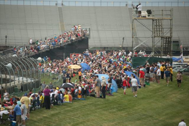 Fans viewing the Angie's List Grand Prix of Indianapolis on the mounds at IMS -- Photo by: Tim Holle