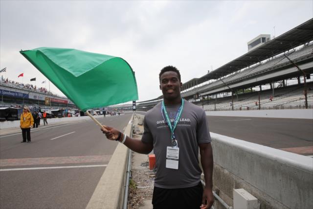 Indianapolis Colts 1st round pick Phillip Dorsett waives the green to start practice for the Indianapolis 500 at the Indianapolis Motor Speedway -- Photo by: Chris Jones