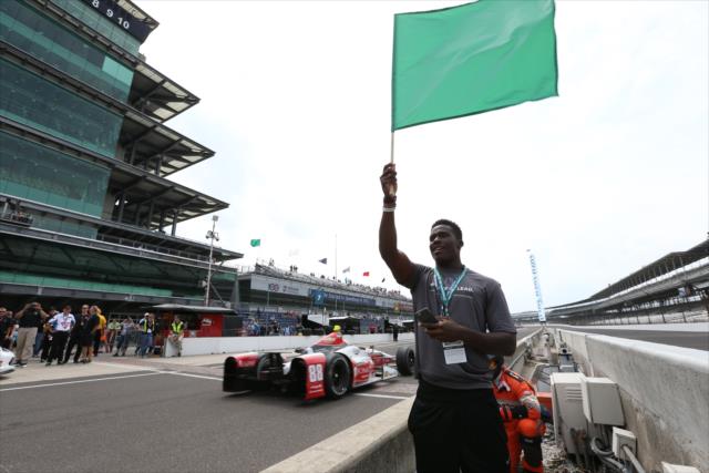 Indianapolis Colts 1st round pick Phillip Dorsett waives the green to start practice for the Indianapolis 500 at the Indianapolis Motor Speedway -- Photo by: Chris Jones