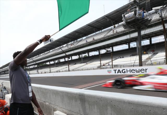 Colts WR Phillip Dorsett waives the green for Bryan Clauson to start practice for the Indianapolis 500 at the Indianapolis Motor Speedway -- Photo by: Chris Jones