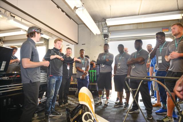 JR Hildebrand and Josef Newgarden with Indianapolis Colts rookies -- Photo by: Doug Mathews