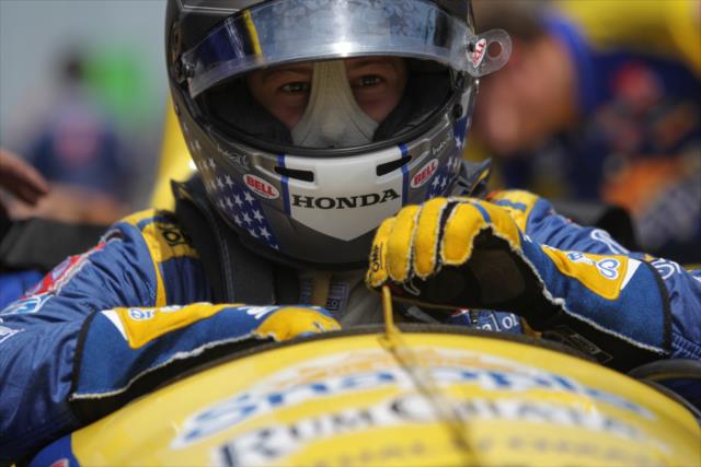 Marco Andretti gets into his car -- Photo by: Joe Skibinski