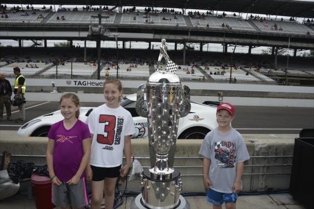 Young fans with Borg Warner trophy -- Photo by: Jim Haines