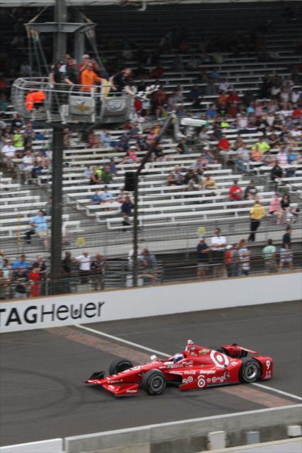 Scott Dixon crosses Yard of Bricks to win the pole position for the 99th running of the Indianapolis 500 -- Photo by: Leigh Spargur