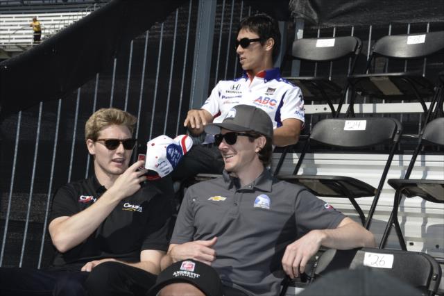 Teammates Josef Newgarden and JR Hildebrand chat prior to the public drivers meeting at the Indianapolis Motor Speedway -- Photo by: Jim Haines