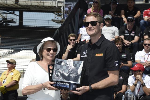 Ryan Hunter-Reay accepts the Winners Drink Milk award during the public drivers meeting at the Indianapolis Motor Speedway -- Photo by: Jim Haines