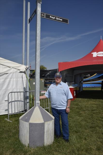 A.J. Foyt poses at the new Foyt Drive on the grounds of the Indianapolis Motor Speedway -- Photo by: Walter Kuhn