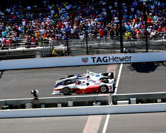 Helio Castroneves and JR Hildebrand across the yard of bricks -- Photo by: Bret Kelley