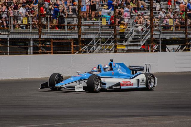 Mario Andretti in a two-seater -- Photo by: Forrest Mellott