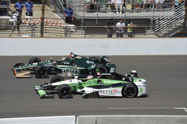 Carlos Munoz and Ed Carpenter on track -- Photo by: Jim Haines