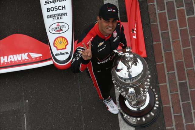 Juan Pablo Montoya wins 99th running of the Indianapolis 500 at the Indianapolis Motor Speedway with Borg-Warner trophy -- Photo by: Chris Jones