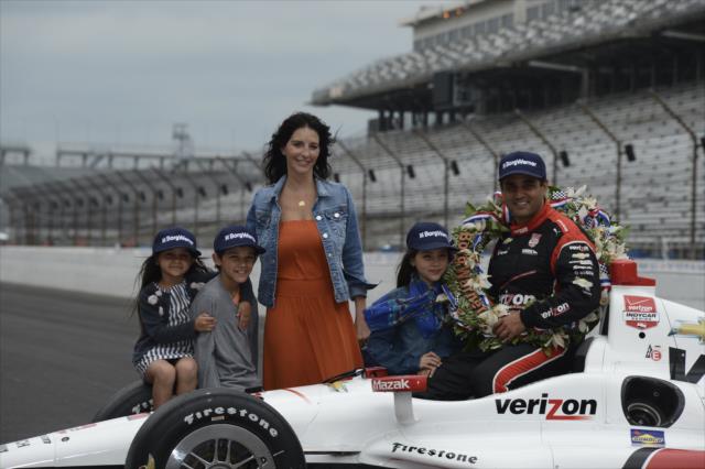 Juan Pablo Montoya wins 99th running of the Indianapolis 500 at the Indianapolis Motor Speedway with family in Borg-Warner hats -- Photo by: Jim Haines