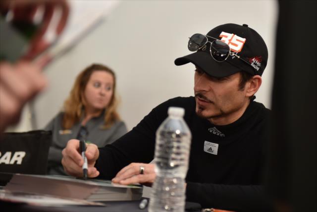 Alex Tagliani during a Verizon IndyCar Series autograph session at the Angie's List Grand Prix of Indianapolis -- Photo by: Eric Anderson