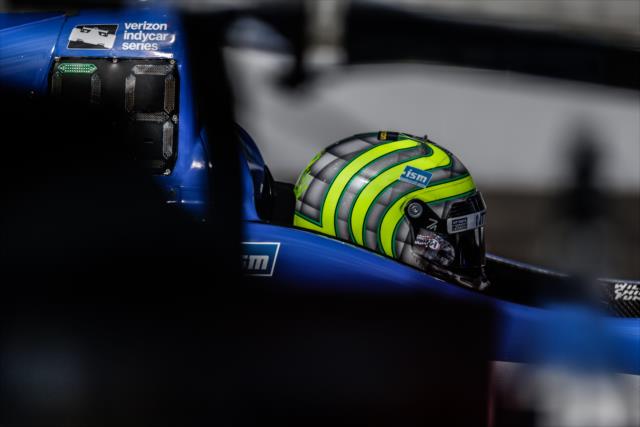 Tony Kanaan sits in his car at IMS -- Photo by: Shawn Gritzmacher