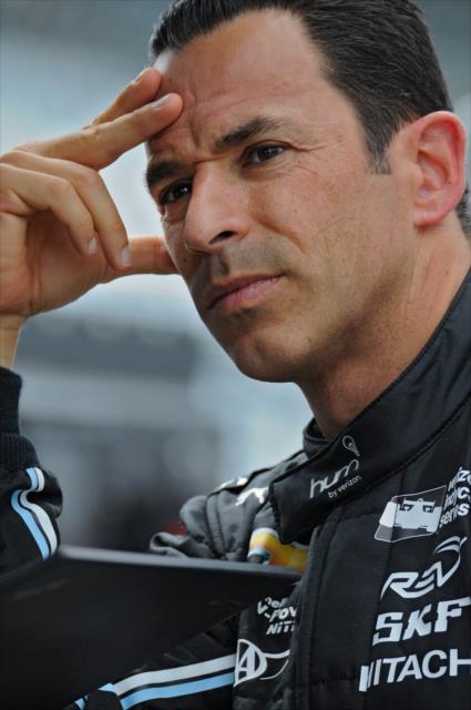 Helio Castroneves in his pit stand following practice for the Angie's List Grand Prix of Indianapolis -- Photo by: Walter Kuhn