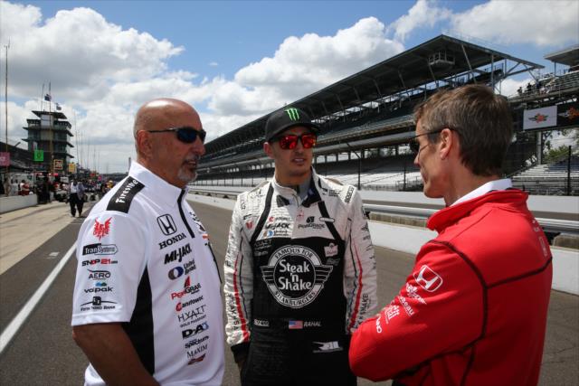 Bobby and Graham Rahal speak with an engineer during practice for the 100th Running of the Indy 500 presented by PennGrade Motor Oil -- Photo by: Chris Jones
