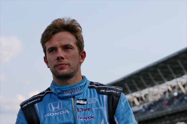 Carlos Munoz walks pit lane during qualifications for the 100th Indianapolis 500 -- Photo by: Chris Jones