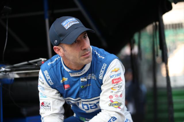 Tony Kanaan sits in his pit stand during qualifications for the 100th Indianapolis 500 -- Photo by: Chris Jones