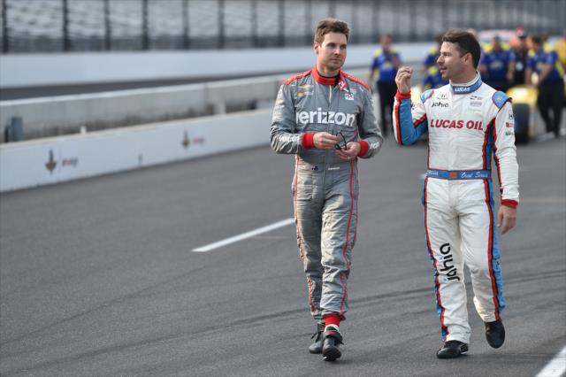 Will Power and Oriol Servia walk pit lane during the Opening Day of Qualifications for the 100th Indianapolis 500 -- Photo by: Chris Owens