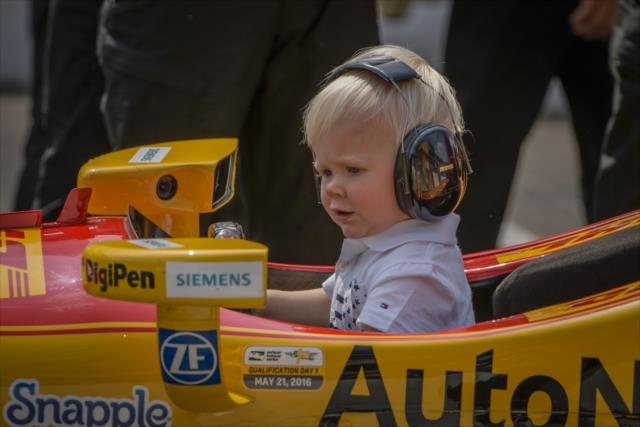 Ryan Hunter-Reay's child sits in his car during qualfications for the 100th Running of the Indy 500 presented by PennGrade Motor Oil -- Photo by: Forrest Mellott