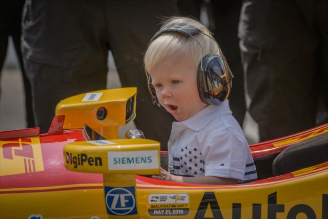 Ryan Hunter-Reay's son sits in his car during qualfications for the 100th Running of the Indy 500 presented by PennGrade Motor Oil -- Photo by: Forrest Mellott
