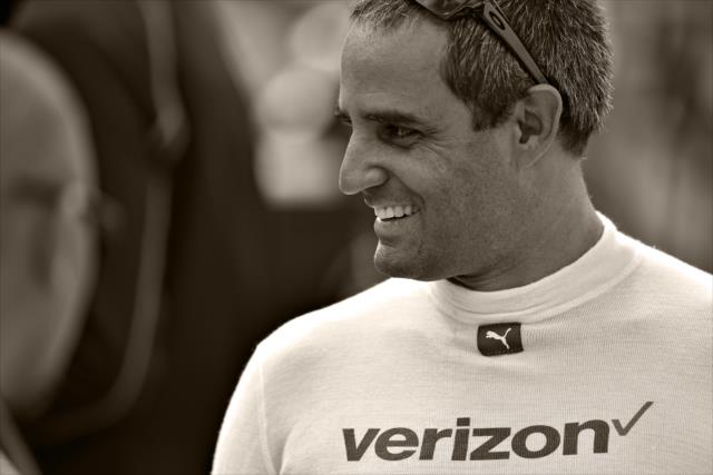 Juan Montoya stands in pit lane during practice for the 100th Running of the Indy 500 presented by PennGrade Motor Oil -- Photo by: John Cote