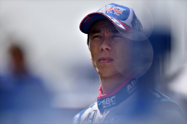 Takuma Sato stands in pit lane during practice for the 100th Running of the Indy 500 presented by PennGrade Motor Oil -- Photo by: John Cote