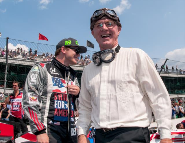 Conor Daly and his father, Derek, with a light moment on pit lane during the Opening Day of Qualifications for the 100th Indianapolis 500 -- Photo by: Mike Finnegan