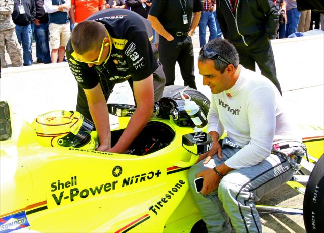 Juan Montoya talks with Simon Pagenaud during qualfications for the 100th Running of the Indy 500 presented by PennGrade Motor Oil -- Photo by: Mike Harding
