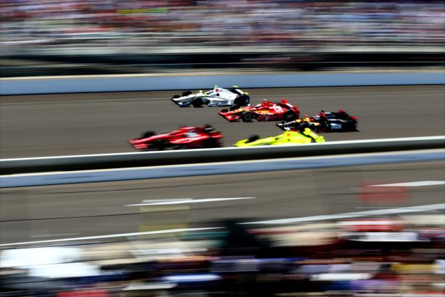 Frentic track action along the frontstretch during the 100th Indianapolis 500 -- Photo by: Bret Kelley