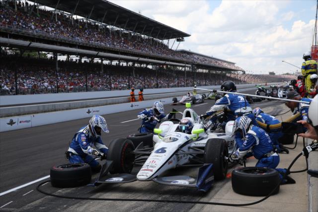 The Ed Carpenter Racing team go to work on JR Hildebrand's machine on pit lane during the 100th Indianapolis 500 -- Photo by: Chris Jones