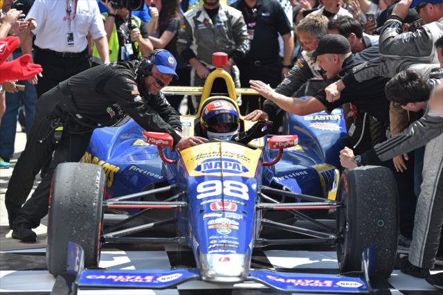Alexander Rossi rolls into victory circle after winning the 100th Running of the Indianapolis 500 presented by PennGrade Motor Oil -- Photo by: Chris Owens