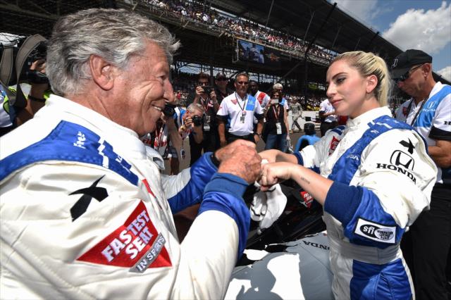 Lady Gaga with Mario Andretti prior to the 100th Running of the Indy 500 presented by PennGrade Motor Oil -- Photo by: Chris Owens