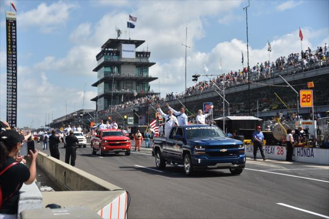 Military members take laps prior to the 100th Running of the Indy 500 presented by PennGrade Motor Oil -- Photo by: Dana Garrett