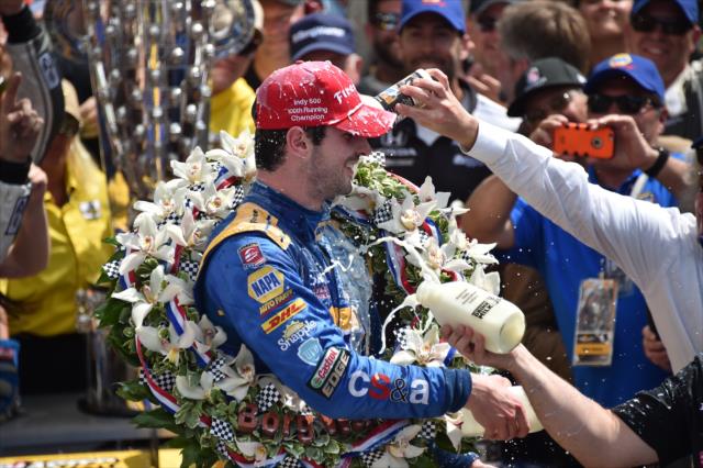 Alexander Rossi celebrates in Victory Circle following his win in the 100th Indianapolis 500 -- Photo by: Dana Garrett