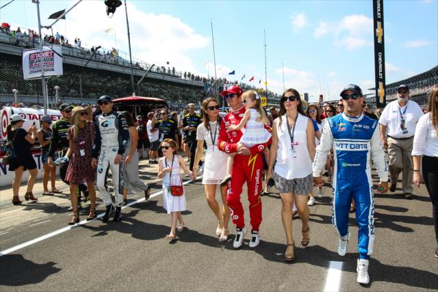 Chip Ganassi Racing team members Max Chilton, Scott Dixon, and Tony Kanaan walk pit lane prior to the start of the 100th Indianapolis 500 -- Photo by: David Yowe