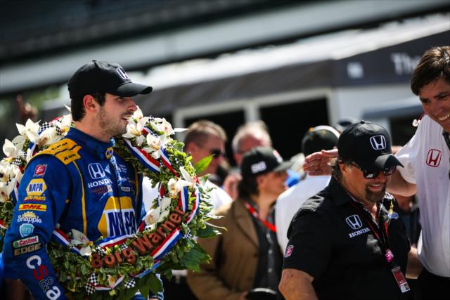 Alexander Rossi celebrates in Victory Circle following his victory in the 100th Indianapolis 500 -- Photo by: David Yowe