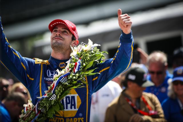 Alexander Rossi celebrates in Victory Circle following his win in the 100th Indianapolis 500 -- Photo by: David Yowe