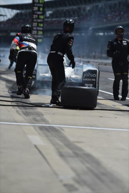Oriol Servia peels out of his pit stall following service during the 100th Indianapolis 500 -- Photo by: Eric Anderson