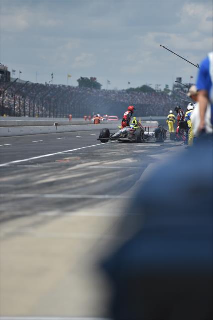 Sebastien Bourdais peels out of pit lane during the 100th Indianapolis 500 -- Photo by: Eric Anderson