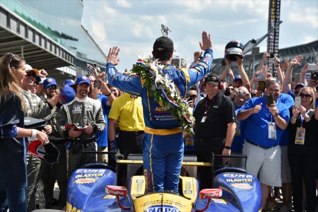 Alexander Rossi waives to his team in Victory Circle after winning the 100th Indianapolis 500 -- Photo by: John Cote