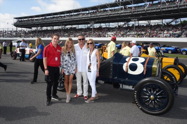 Gil de Ferran and his family pose for a photograph during the 100th Indianapolis 500 -- Photo by: Jim Haines